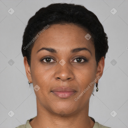 Joyful black young-adult female with short  black hair and brown eyes