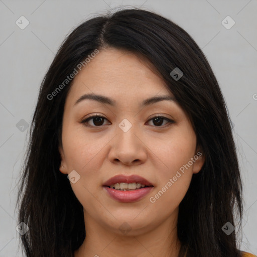 Joyful latino young-adult female with long  brown hair and brown eyes