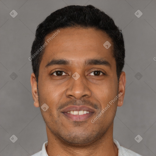 Joyful latino young-adult male with short  black hair and brown eyes