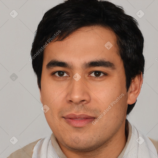 Joyful asian young-adult male with short  black hair and brown eyes