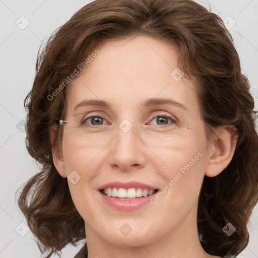 Joyful white young-adult female with medium  brown hair and green eyes