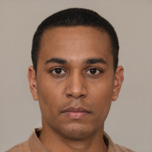 Neutral latino young-adult male with short  brown hair and brown eyes