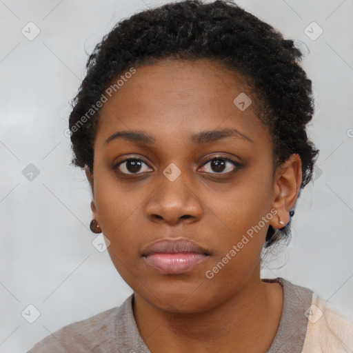 Neutral black young-adult female with short  black hair and brown eyes