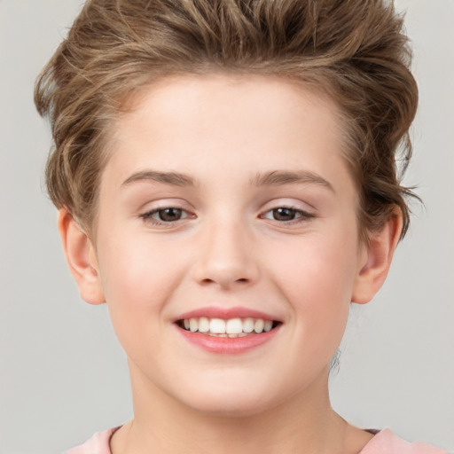 Joyful white child female with short  brown hair and brown eyes