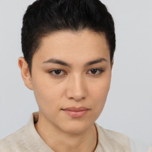 Joyful asian young-adult female with short  brown hair and brown eyes