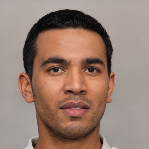 Neutral latino young-adult male with short  black hair and brown eyes