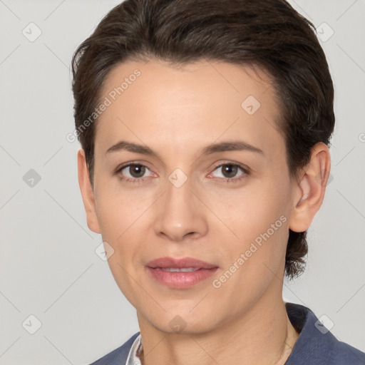 Joyful white adult female with short  brown hair and brown eyes