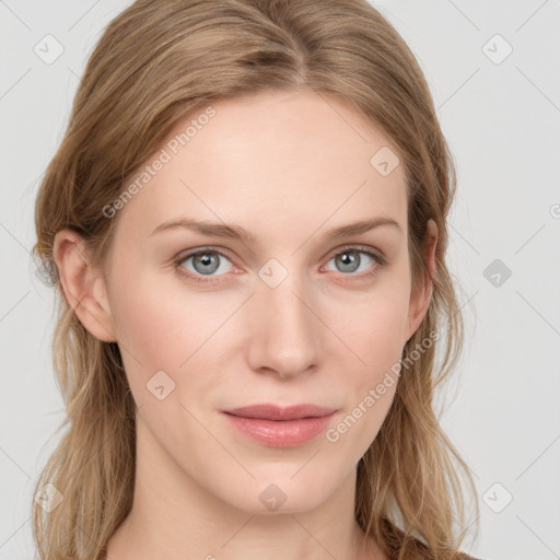 Joyful white young-adult female with long  brown hair and blue eyes