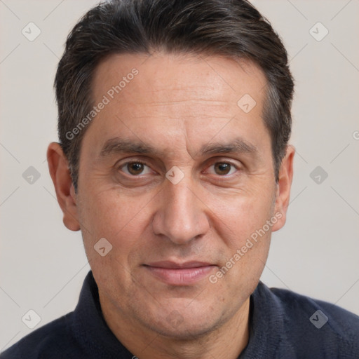 Joyful white adult male with short  brown hair and brown eyes