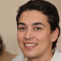 Joyful white young-adult male with medium  brown hair and brown eyes