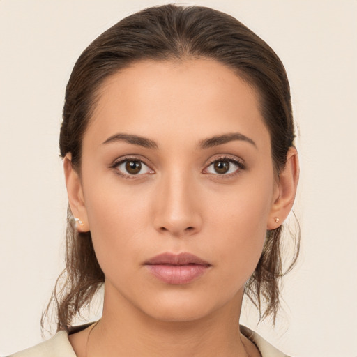 Neutral white young-adult female with medium  brown hair and brown eyes