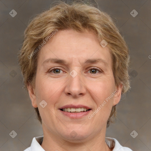 Joyful white adult female with short  brown hair and brown eyes