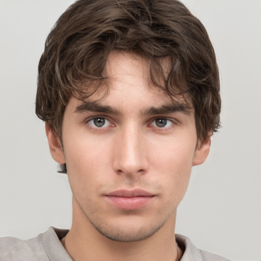 Neutral white young-adult male with short  brown hair and grey eyes