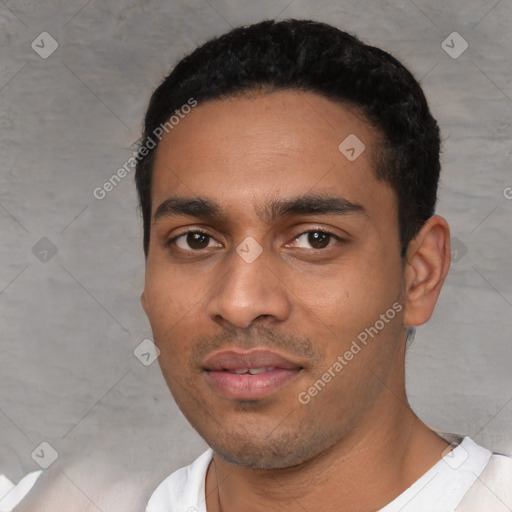 Neutral white young-adult male with short  black hair and brown eyes