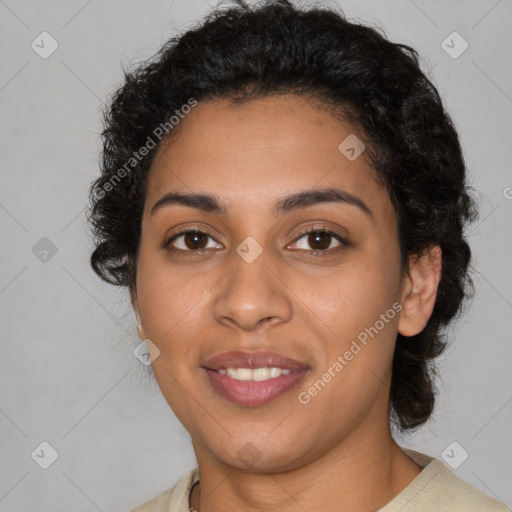 Joyful latino young-adult female with short  brown hair and brown eyes