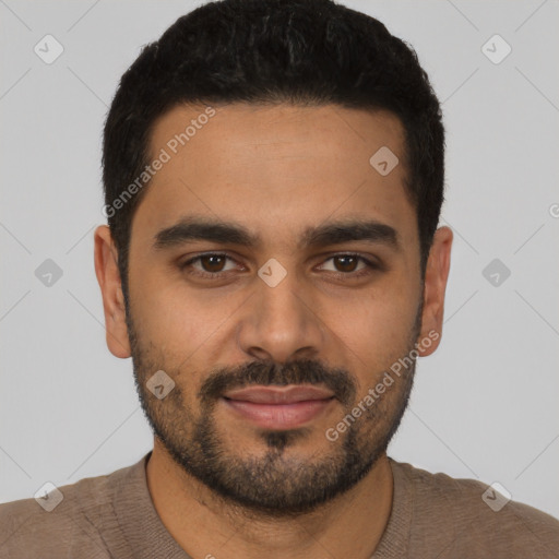 Joyful latino young-adult male with short  black hair and brown eyes