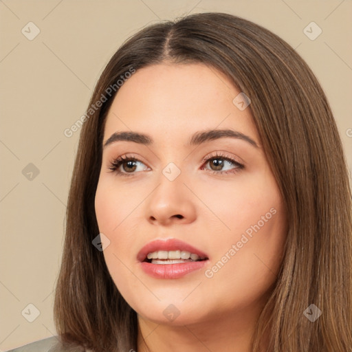 Neutral white young-adult female with long  brown hair and brown eyes