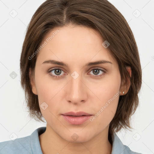 Neutral white young-adult female with medium  brown hair and brown eyes