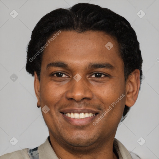 Joyful latino young-adult male with short  black hair and brown eyes