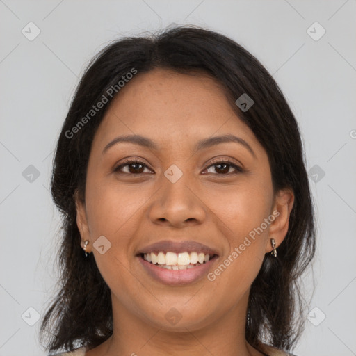 Joyful latino young-adult female with medium  brown hair and brown eyes