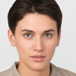 Neutral white young-adult female with short  brown hair and brown eyes