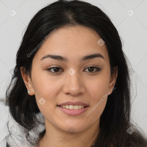 Joyful asian young-adult female with long  brown hair and brown eyes