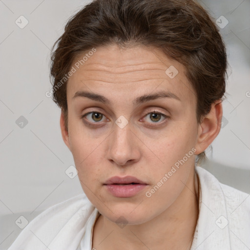 Neutral white young-adult female with short  brown hair and grey eyes