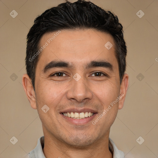 Joyful white young-adult male with short  black hair and brown eyes