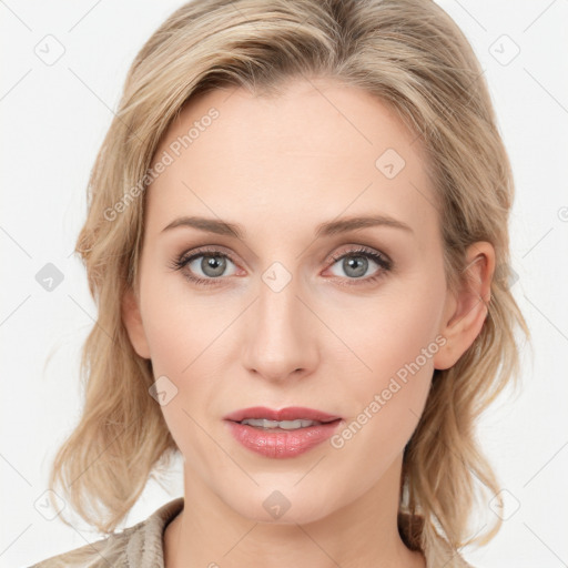 Joyful white young-adult female with long  brown hair and blue eyes