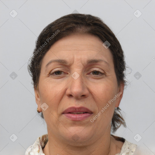 Joyful white middle-aged female with short  brown hair and brown eyes