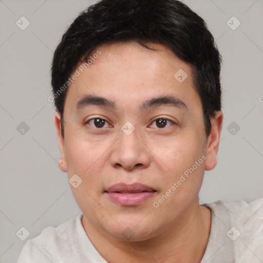 Joyful white young-adult male with short  black hair and brown eyes