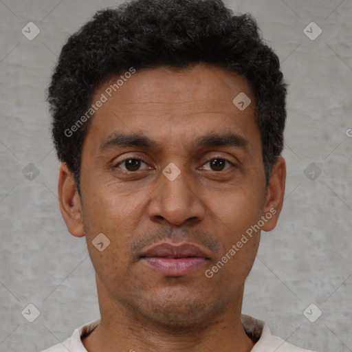 Neutral latino young-adult male with short  brown hair and brown eyes