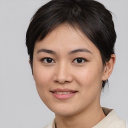 Joyful white young-adult female with medium  brown hair and brown eyes