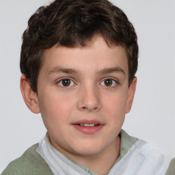 Joyful white child male with short  brown hair and brown eyes