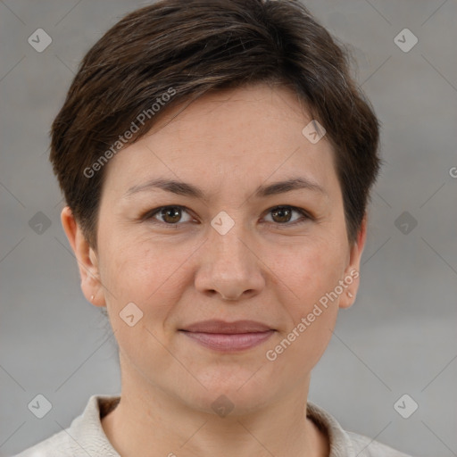 Joyful white adult female with short  brown hair and brown eyes