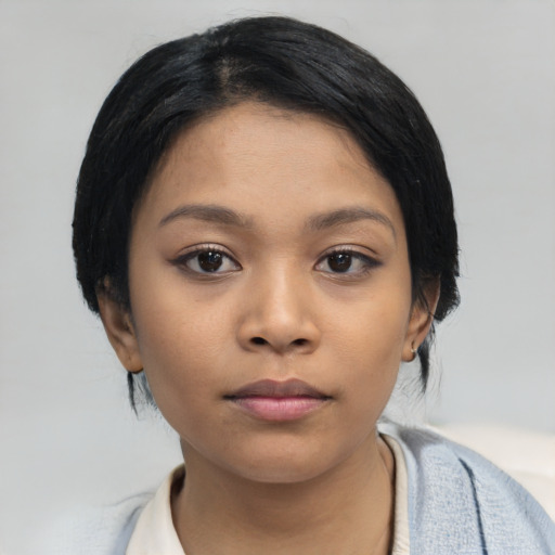 Neutral asian young-adult female with medium  black hair and brown eyes