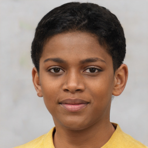 Joyful black child female with short  black hair and brown eyes