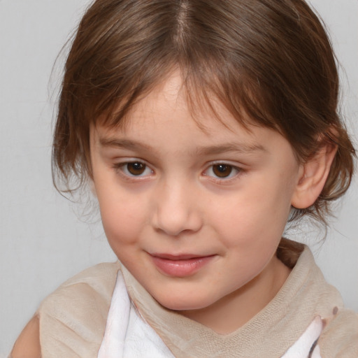 Joyful white child female with medium  brown hair and brown eyes