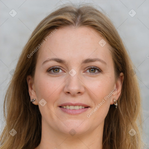 Joyful white adult female with long  brown hair and grey eyes