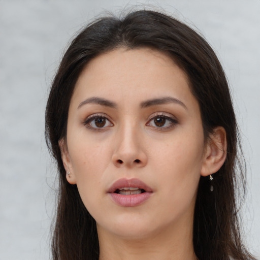 Neutral asian young-adult female with long  brown hair and brown eyes