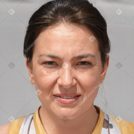 Joyful white adult female with short  brown hair and brown eyes