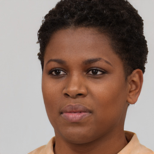 Neutral black young-adult female with short  brown hair and brown eyes