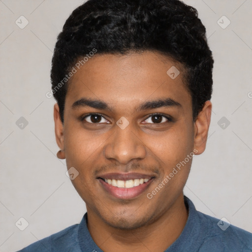 Joyful black young-adult male with short  black hair and brown eyes