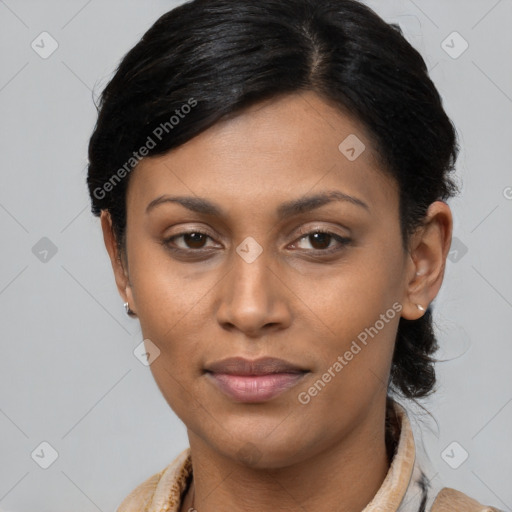 Joyful latino young-adult female with medium  black hair and brown eyes