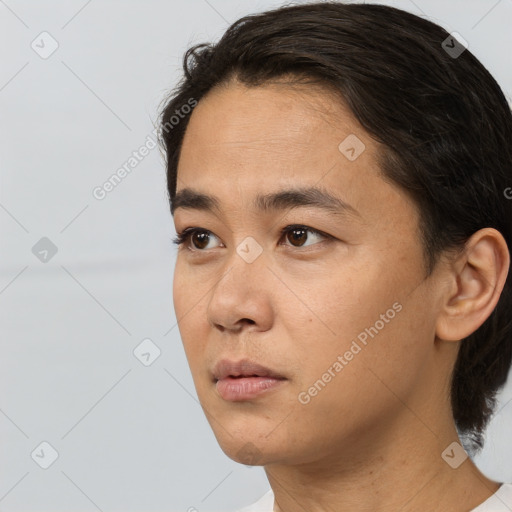 Neutral white young-adult male with short  black hair and brown eyes