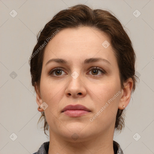 Neutral white young-adult female with medium  brown hair and grey eyes