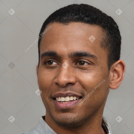 Joyful latino young-adult male with short  black hair and brown eyes