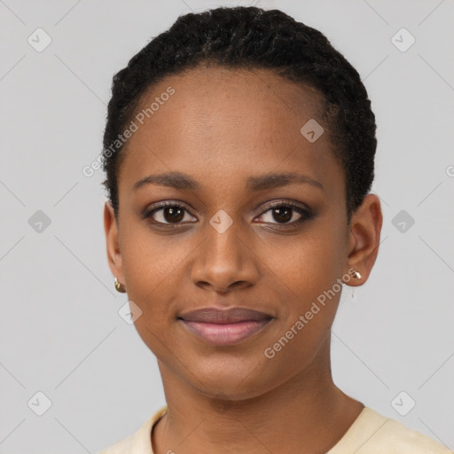 Joyful black young-adult female with short  black hair and brown eyes