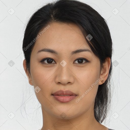 Joyful asian young-adult female with medium  brown hair and brown eyes