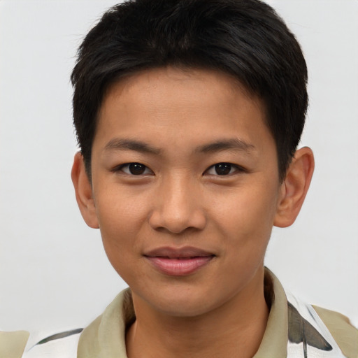 Joyful asian young-adult female with short  brown hair and brown eyes